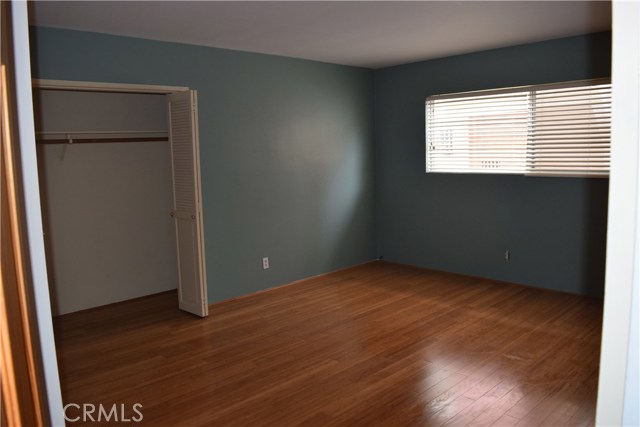 Good size master bedroom showing wall closet - also has a walk-in closet.