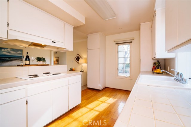 The bright and functional kitchen that it open to the family room and dining area has the potential to be a spectacular living space.