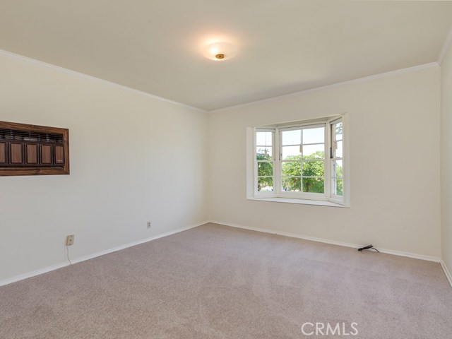 Spacious front bedroom with harbor and city view