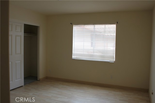 Fourth bedroom with sliding closet doors