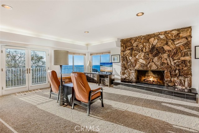 Master Bedroom Sitting Area / Expansive Fireplace