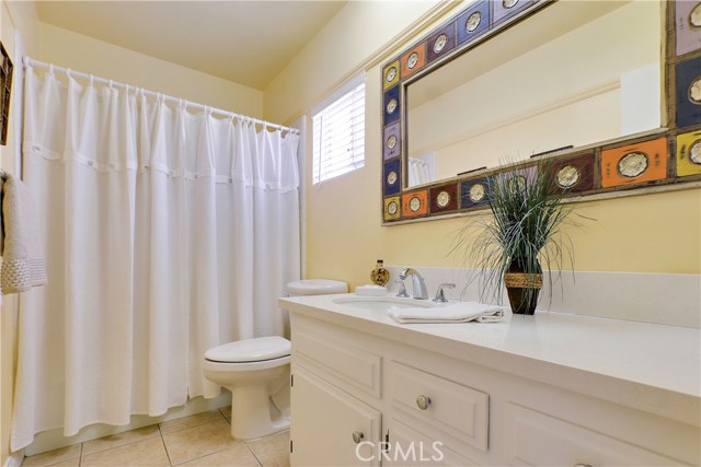  Full bathroom located on the first level… White quartz countertops will blend with any decor!