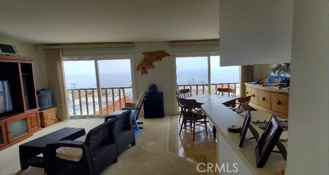 Unobstructed views from Living, Dining, Breakfast Bar and Kitchen in Upper Unit