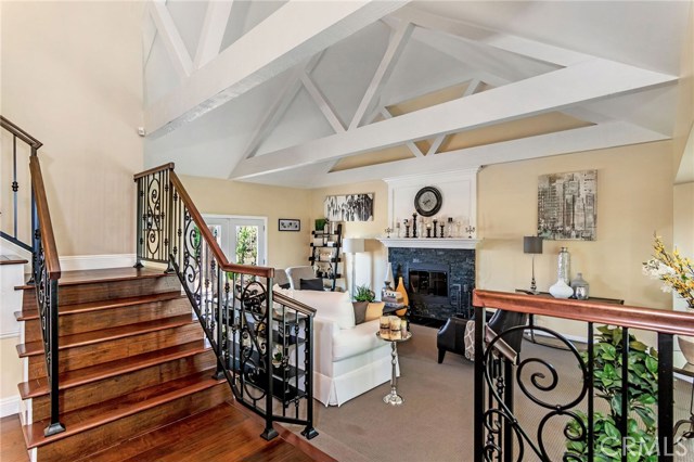 Elegant Foyer takes you straight up the majestic staircase.