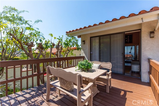 This patio faces the entry and is off of the home office on the main level.