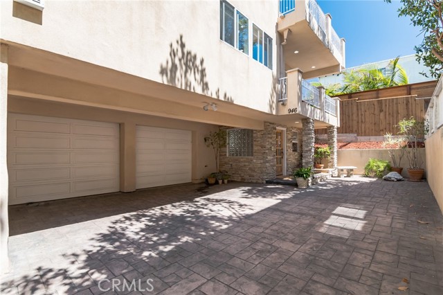 Private, and rare,  luxury driveway leading to oversized two car garage with room for 4+ cars in the driveway!