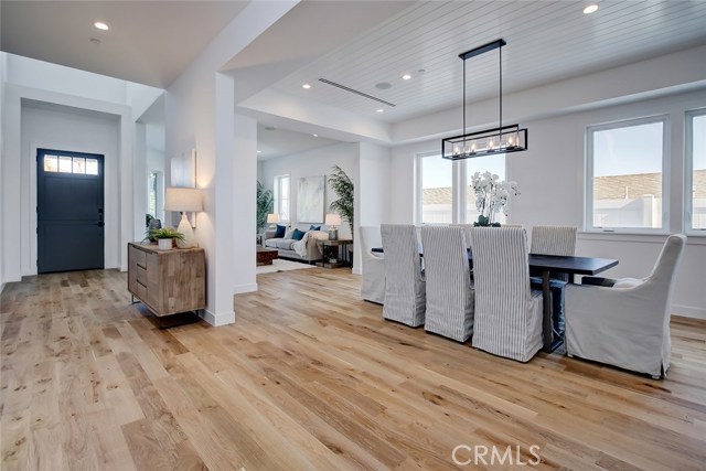 Open and airy foyer / living and dining room