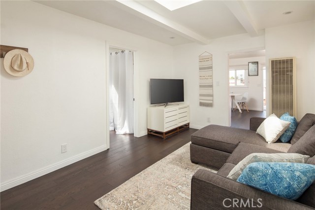 Front room leading to kitchen and 1st bedroom