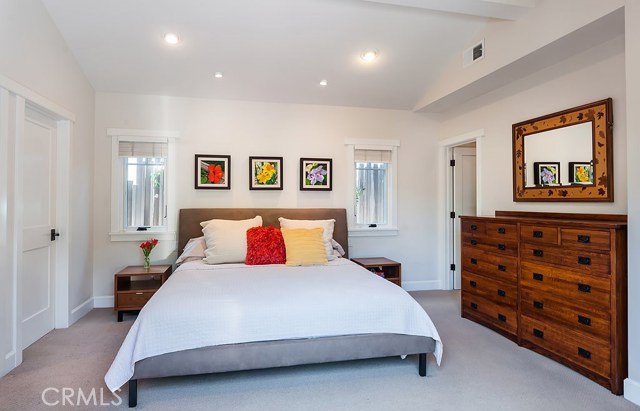 A closet on either side of the bed