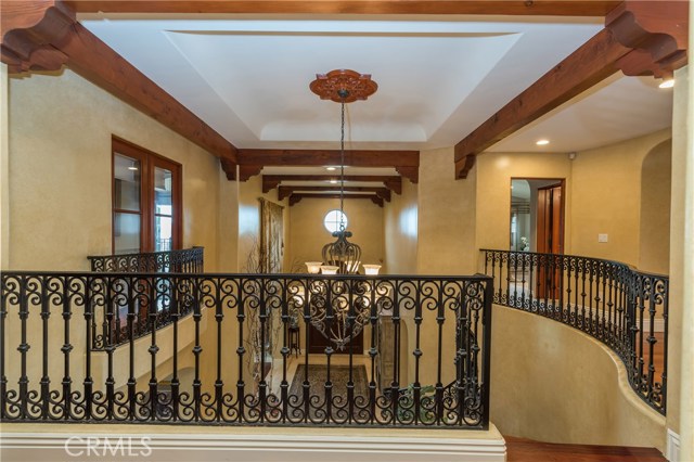 View from the upstairs landing looking toward the interior courtyard/front entrance.