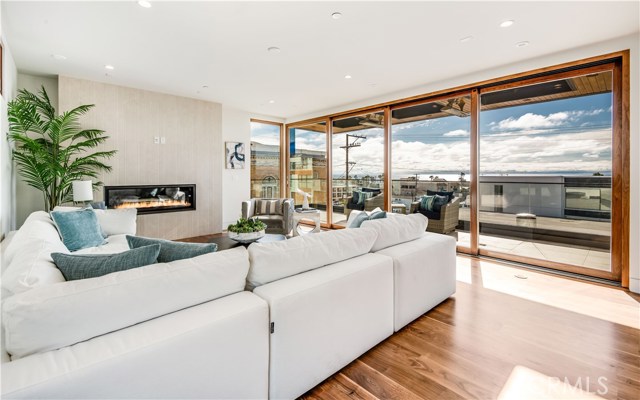 Family room looking south west with fireplace and La Cantina Slider doors