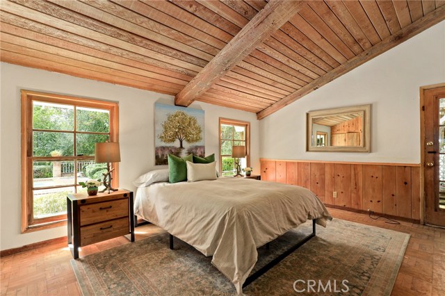 Third bedroom on the right side of the home....plenty of space and natural light coming through....also with access to charming side patio!