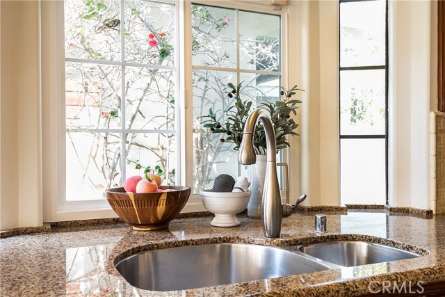 Stainless steel kitchen sink and fixtures