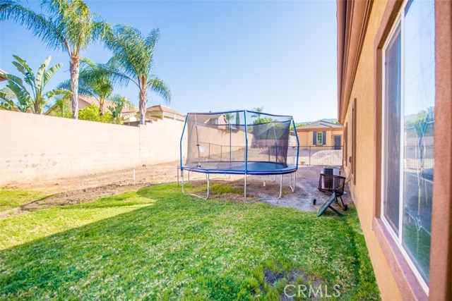 Large Side Yard. Trampoline is included with the house!