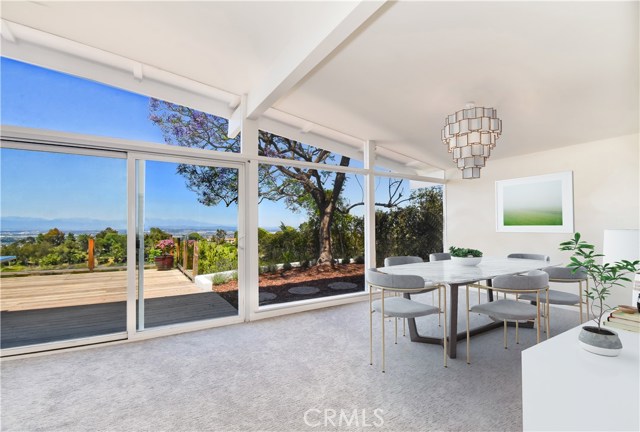 Virtually staged dining room to showcase endless possibilities.