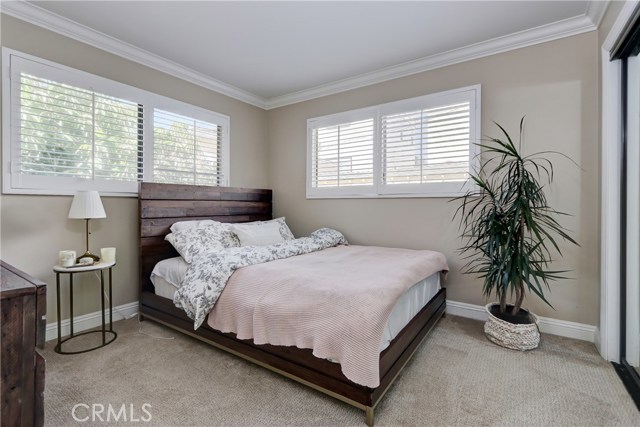 The one bedroom is spacious and features plantation shutters.