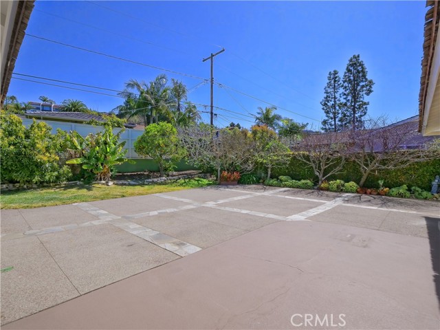 View of grassy area from rear of home.