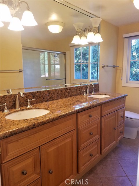 Upstairs bathroom 1 with dual sinks