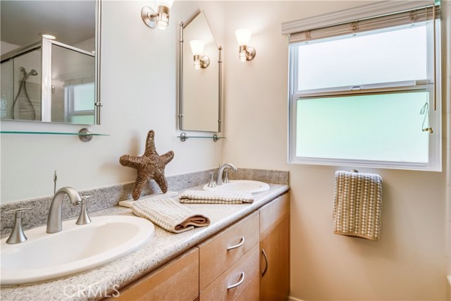 Remodeled hall bath with with tub and  shower