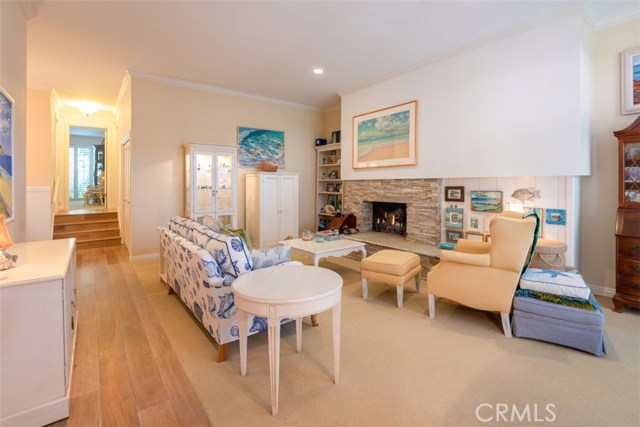 Wood floors flow through the Living area, Dining room & Kitchen.