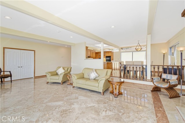 Living room, step up dining room and a peak of the remodeled kitchen which also has the view!