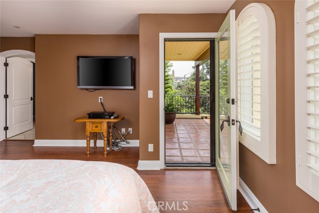 Step outside your master suite for morning coffee