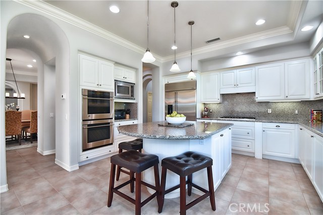 Wonderful kitchen has double ovens and is next to Butler's Pantry and Formal Dining Room.