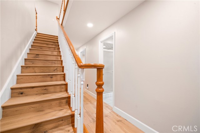 Stairway that leads from the direct access garage to the main floor living.