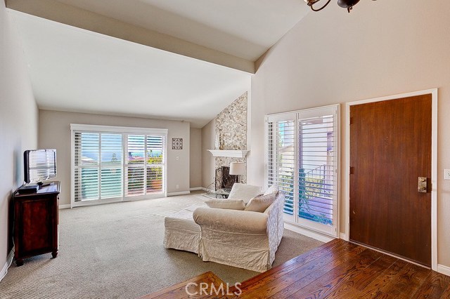 Entryway looking toward living room and ocean view. Entryway looking toward living room and ocean view.