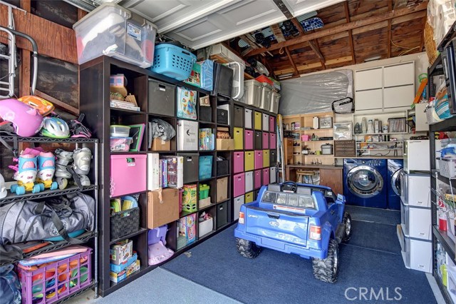 Garage with laundry area in back & direct access to house