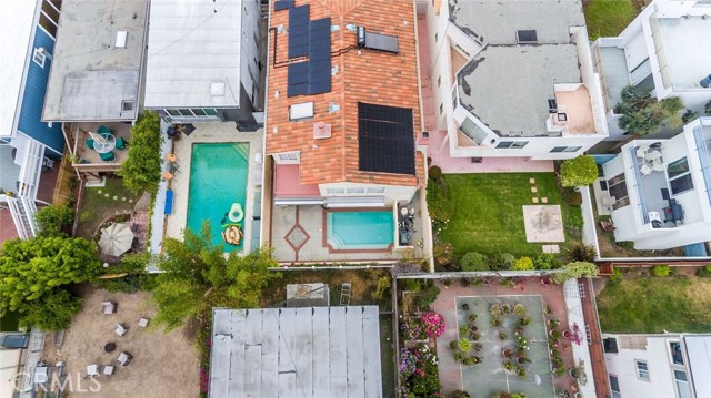 Overhead view from the South, solar panels for pool and electrical power.