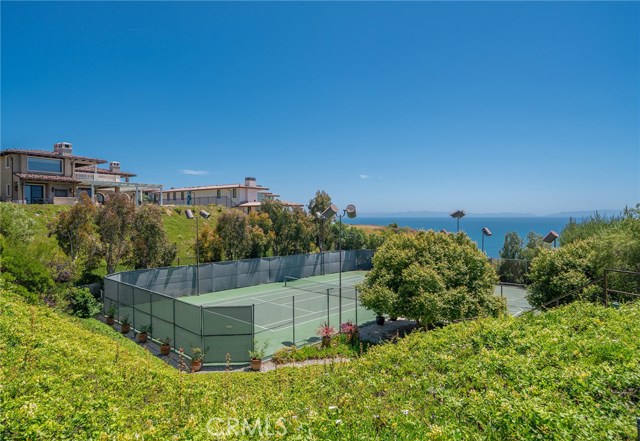 The second tennis is court is located closer to the bluffs.