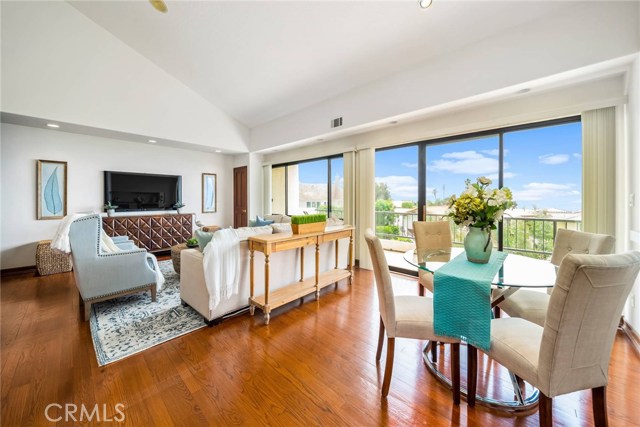 Upstairs family rm with bar, deck, view and casual dining