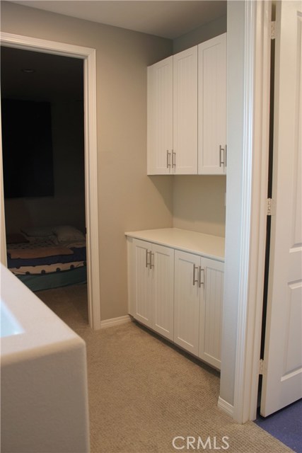 Additional cabinets in the hallway.