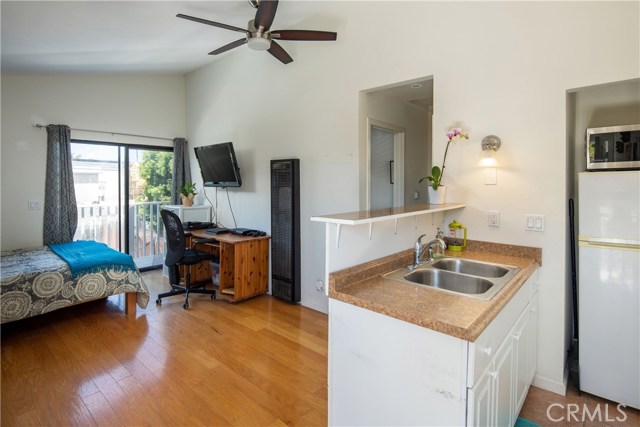 Living room with deck in rear unit