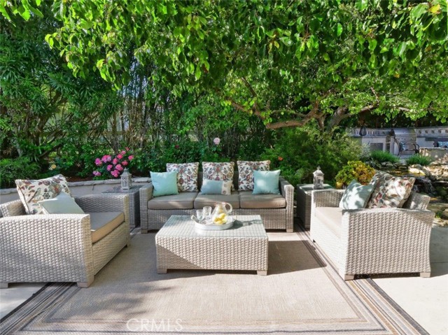 Large sitting area in backyard patio