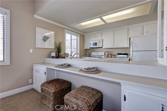 Terrific for friends and family with storage under the bar area and seating for two!