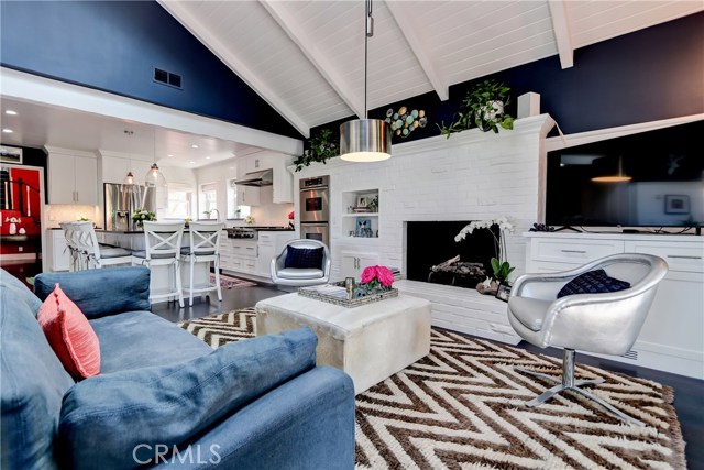 Adjacent to the chef's kitchen, entertaining flows seamlessly into the great room with wonderful fireplace and built-ins.