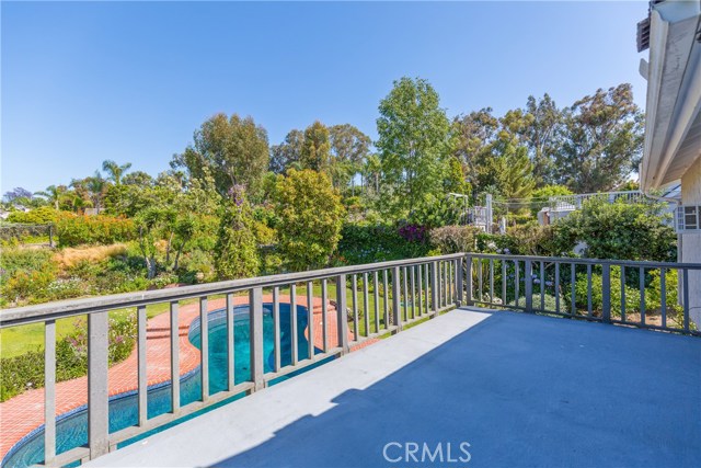 Balcony off of master bedroom over looking the backyard.