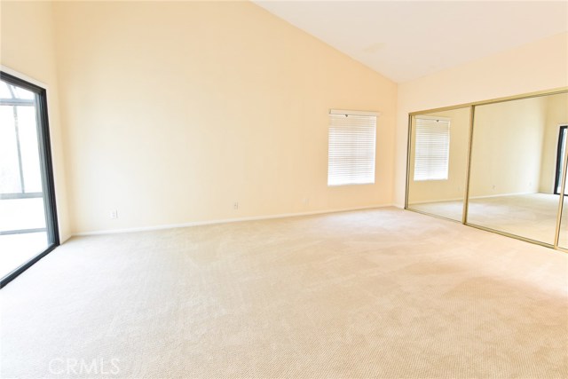 Master bedroom with vaulted ceilings