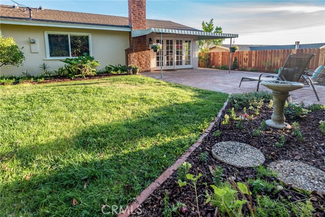 Back yard and brick patio