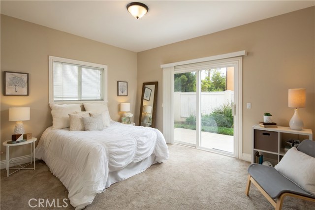 Bedroom #3 - A bright and spacious retreat with large closets and direct access to the private backyard.