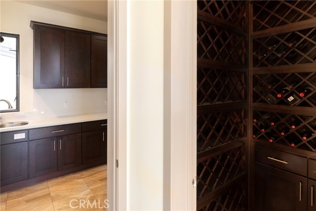 Wine room on right and butler's pantry on left