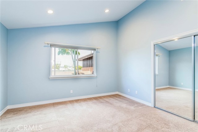 Bedroom #5 with vaulted ceilings and large closet