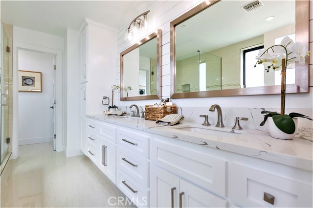 The Double Sink Vanity has Abundant Storage and there are two Large Horizontal Dressing Mirrors
