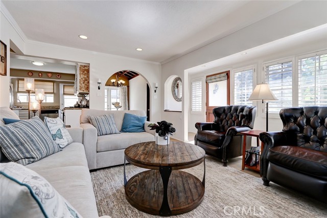 Charming arches plus a dutch door provides additional architectural interest.