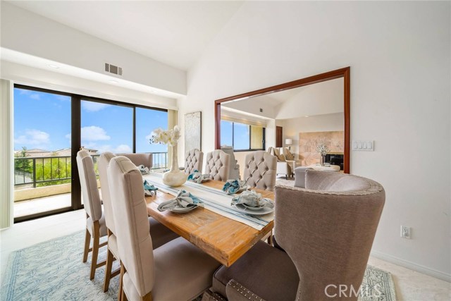 Dining room with deck and ocean view