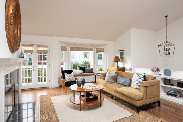 Sunny living room with high ceilings
