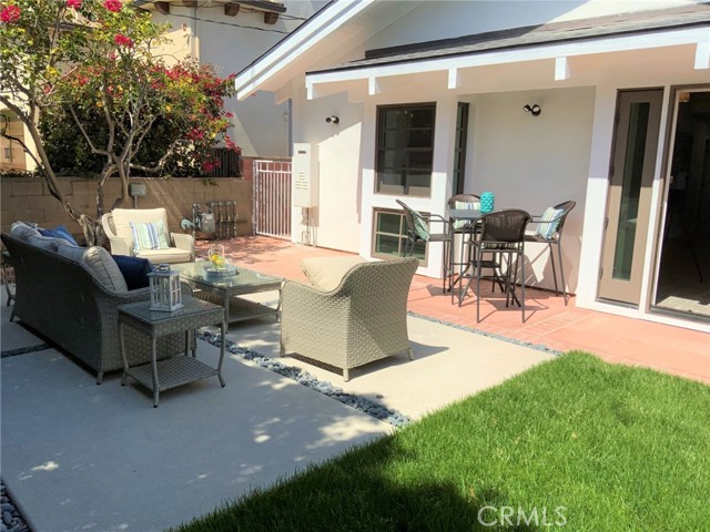 The side yard just off the greatroom, kitchen and dining room is ideal for bbq-ing, entertaining, dining or just sit in the sun and relax. this multi-purpose outdoor space can be transformed into your own vision