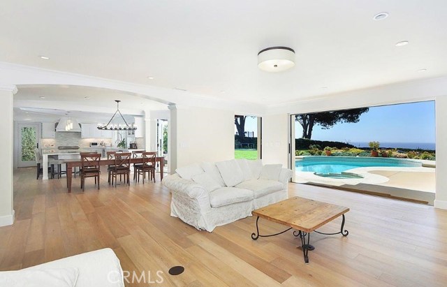 Dual Sliding Pocket Doors Open to Pool Deck